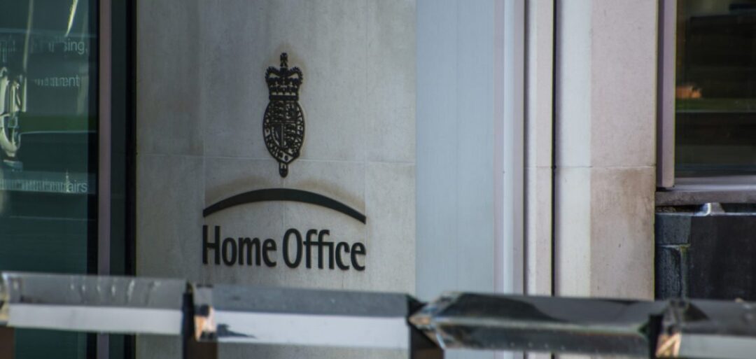 To refer to the pre-arrival tax planning section of this tax guide for Hong Kong residents moving to the UK, this photo is an image of the UK Home Office building. The logo can be seen, alongside some of the stone of the building. 