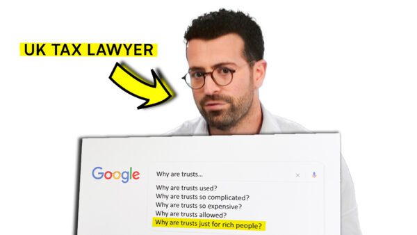 Ben Rosen, a UK tax lawyer, holds up a board of Google's most searched questions about trusts.